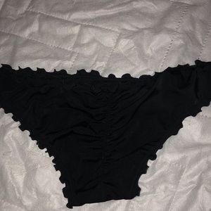 Women’s black bikini ruffled bottoms